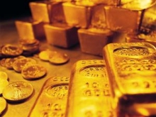 Средняя стоимость золота в 2011 году вырастет на 23% - до $1500 за унцию