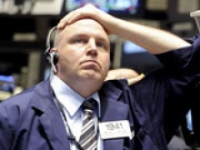 Американские биржи закрылись в минусе после рекордного недельного ралли
