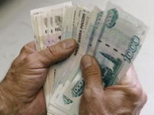 Россияне несут в банки по пять миллиардов рублей в день