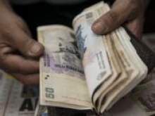 Инвесторы ожидают новую девальвацию аргентинского песо