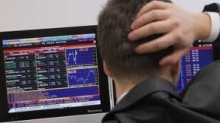 Казахстанская фондовая биржа снизила объемы торгов