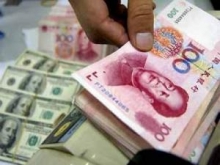 Курс юаня к доллару установил новый рекорд