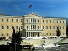 Fitch понизило рейтинги банков Греции вслед за снижением рейтинга страны