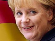 Меркель призывает ускорить проведение антикризисных реформ в зоне евро