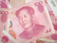Курс юаня к доллару США опустился до минимума с октября 2012 года