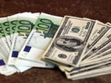Доллар дешевеет к евро после публикации протокола заседания ЕЦБ