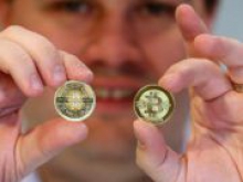 Новая валюта взорвала рынок: курс Bitcoin впервые превысил отметку в 1000 долларов
