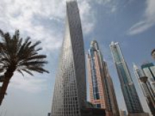 Самое высокое в мире здание спиральной формы Infinity Tower открылось в Дубае