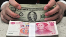 В Китае призвали готовиться к отключению от долларовых платежных систем